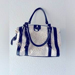 London Fog Leather Ostrich inspired handbag.